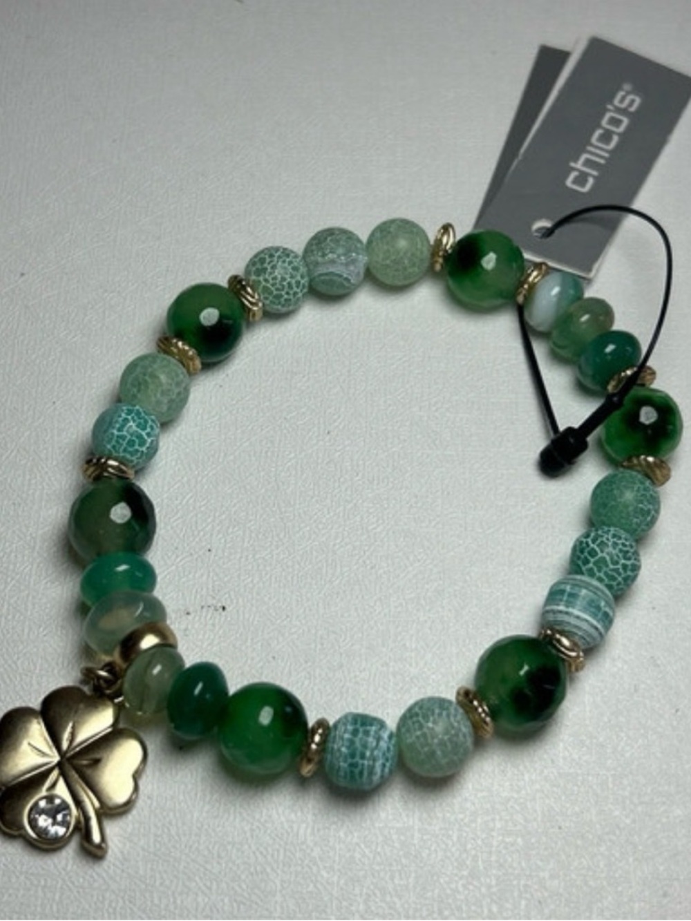 Chico's Green Beaded Stretch Bracelet. Clover Charm. Perfect for Moms Day. NWT.